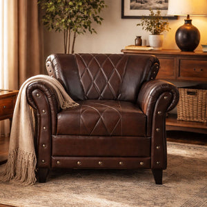 STUDDED LEATHER ARM CHAIR Philbee Interiors 