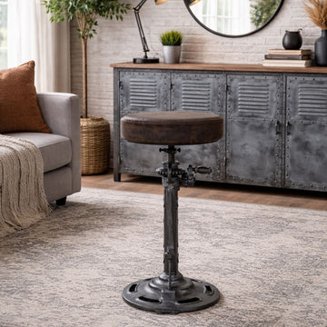 VINTAGE LEATHER WINDUP STOOL Philbee Interiors 