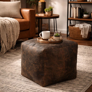 VINTAGE LEATHER OTTOMAN Philbee Interiors 