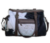 COWHIDE DUFFLE BAG Philbee Interiors 