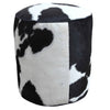 CYLINDRICAL COWHIDE OTTOMAN Philbee Interiors 