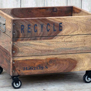INDUSTRIAL RECYCLE BASKET ON CAST IRON WHEELS Philbee Interiors 